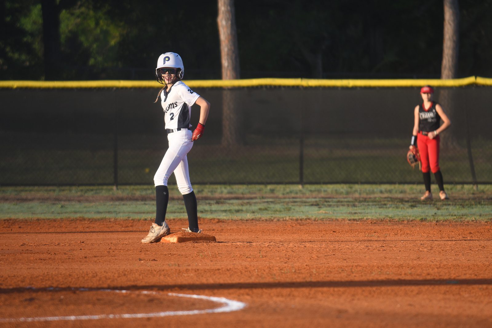 Camden standing on second base in a white Phenoms uniform