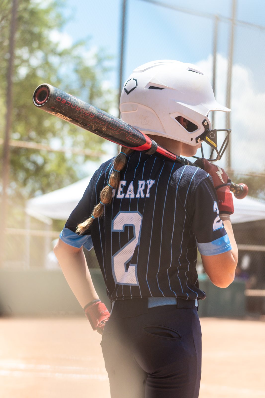 Camden waiting on deck, GEARY and number 2 across the back of her jersey